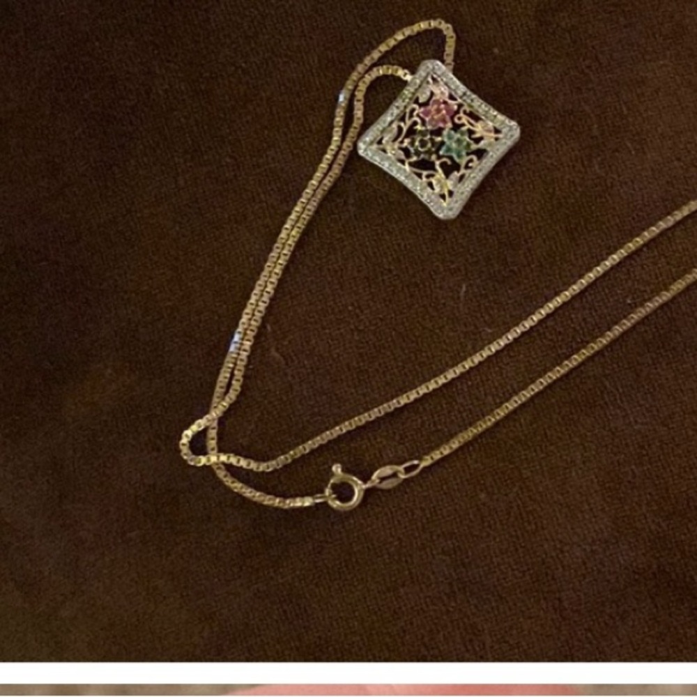 Elegant Gold and Silver Pendant Necklace